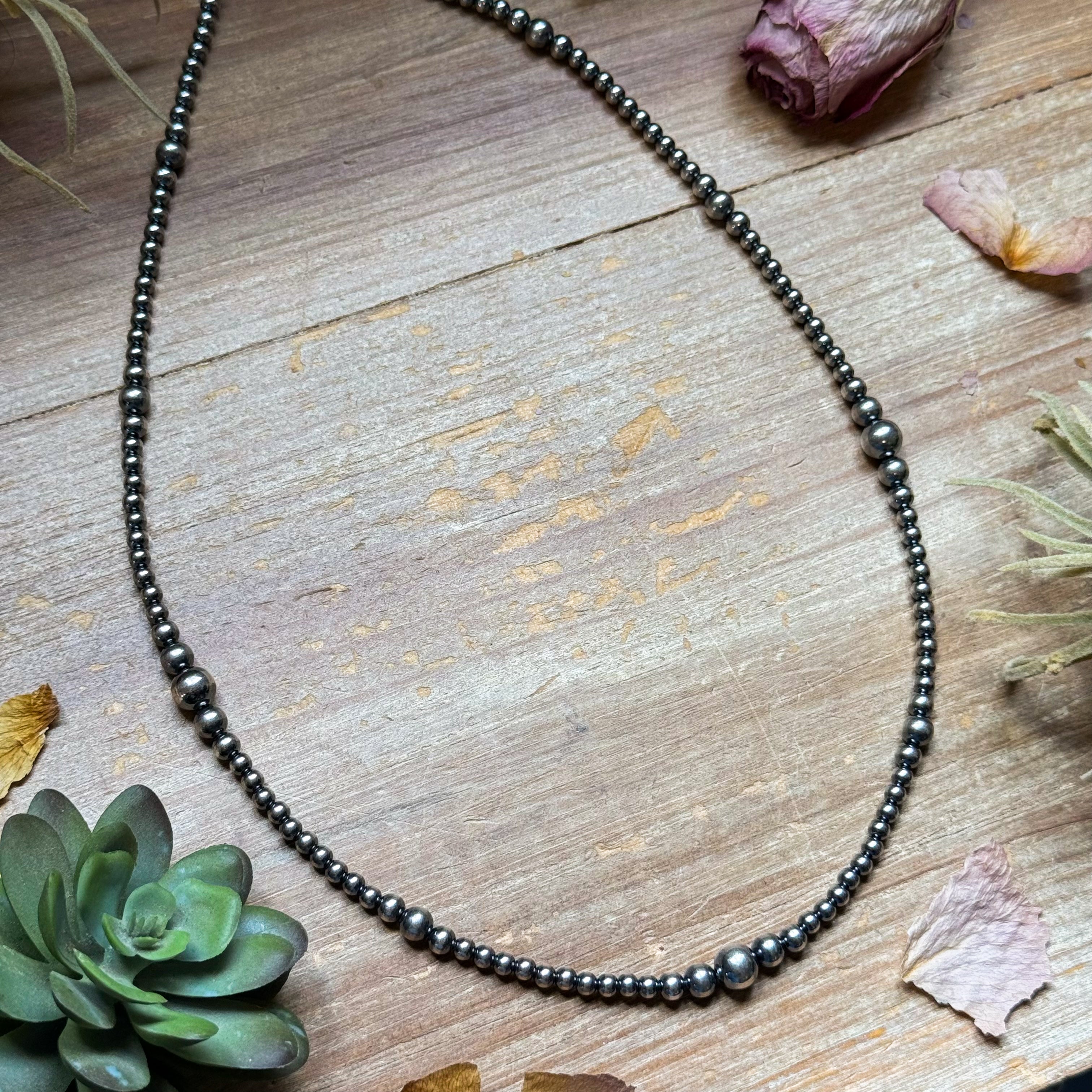 22 inch Sterling Silver Pearls graduated necklace