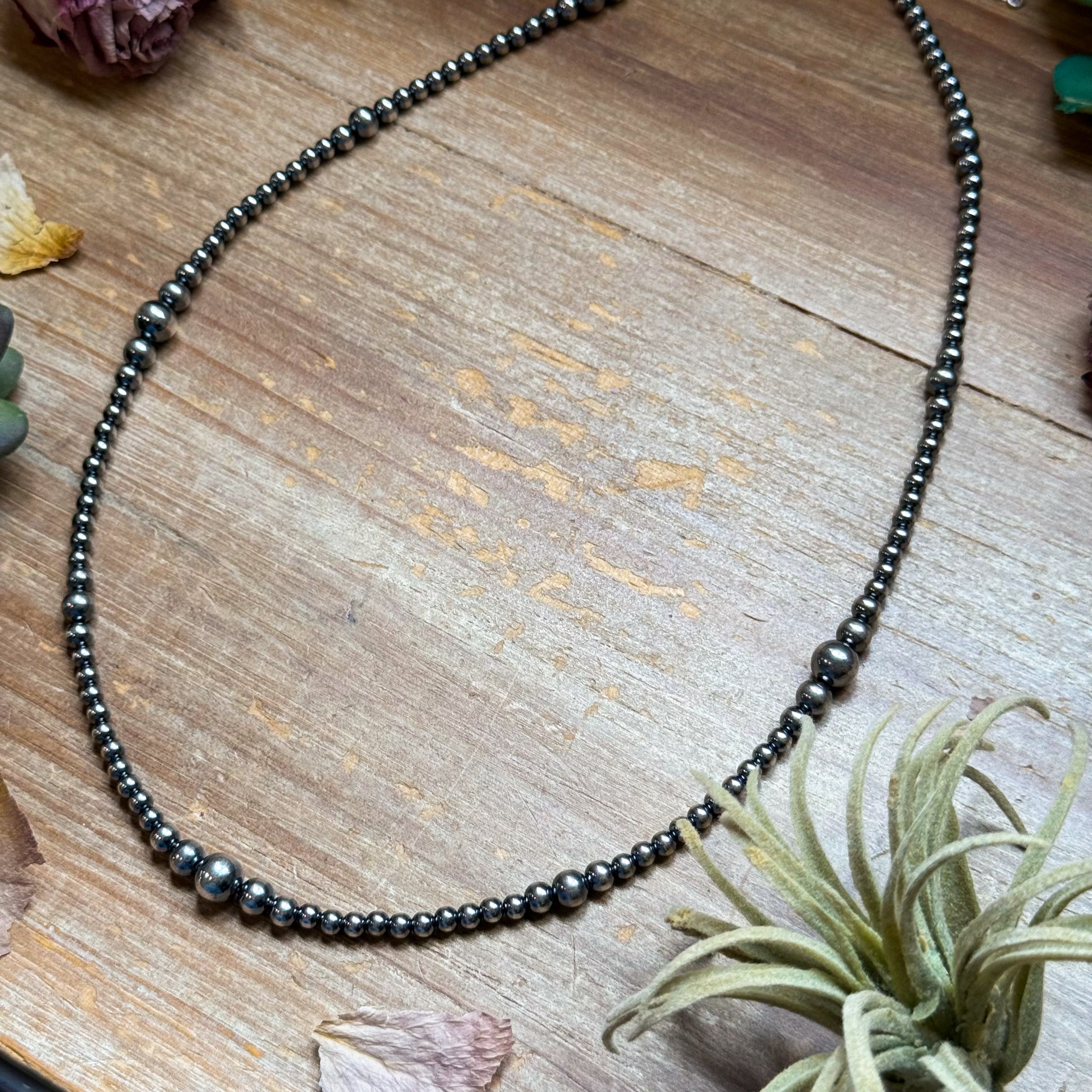 22 inch Sterling Silver Pearls graduated necklace